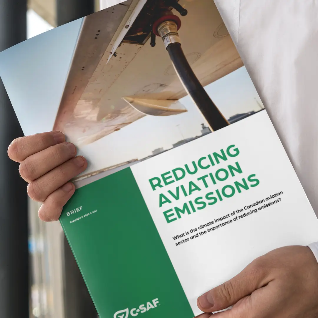 A person holding a copy of a SAF briefing report